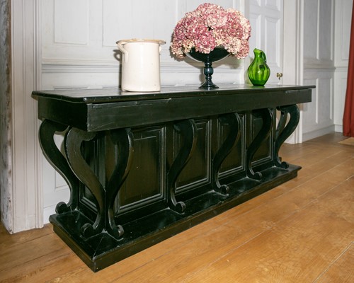 Lot 43 - An early 20th century ebonised sideboard with...