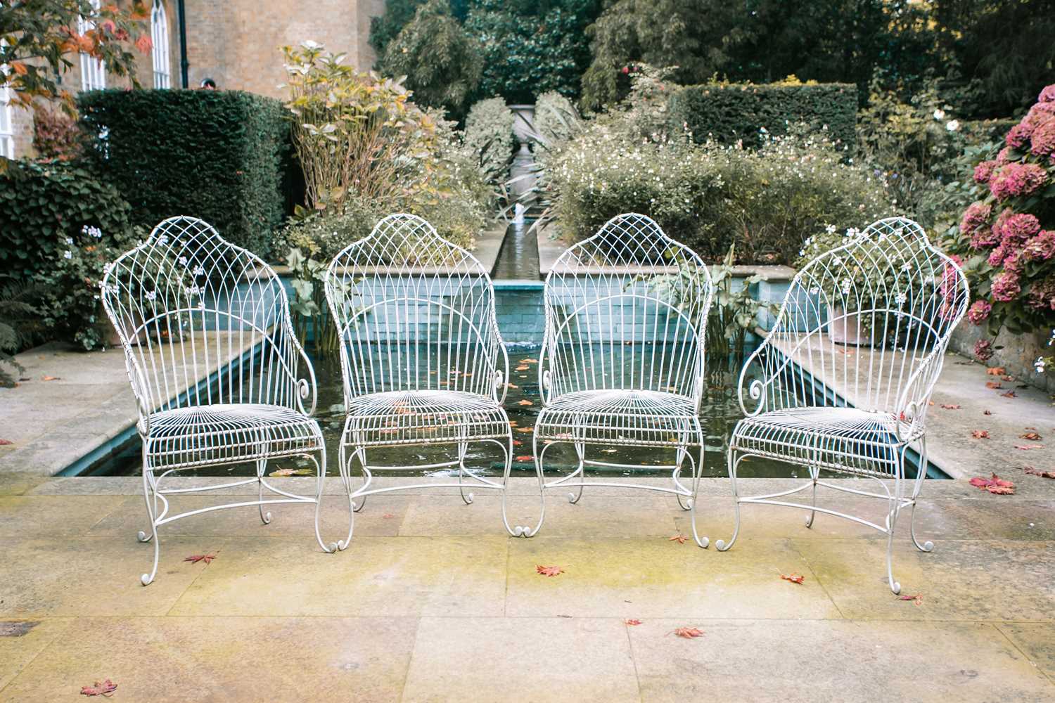 Lot 59 - A set of four sage coloured Regency style...