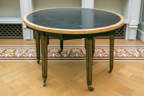 Lot 70 - A George IV style ebonised and parcel gilt...