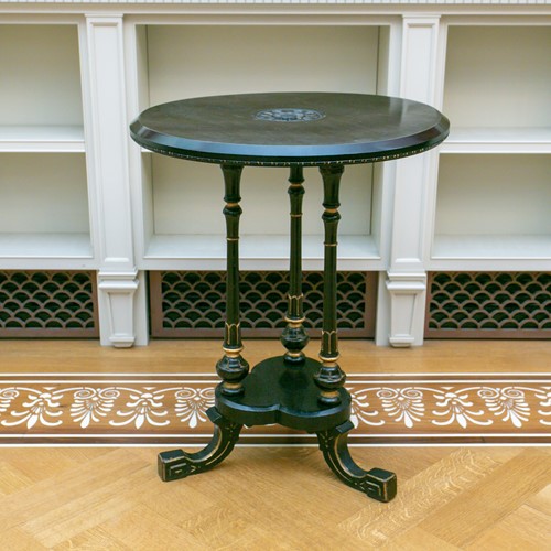 Lot 71 - An early 20th century carved ebonised and...