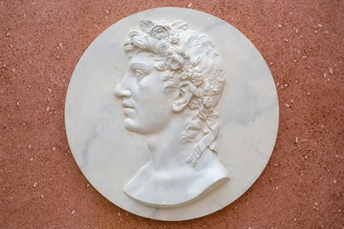 Lot 77 - A late 20th century simulated marble plaster...