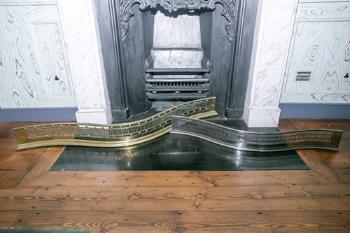Lot 96 - A George III style pierced brass serpentine...