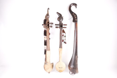 Lot 183 - Three Tibetan lutes, Sgra - Snyan, each carved...
