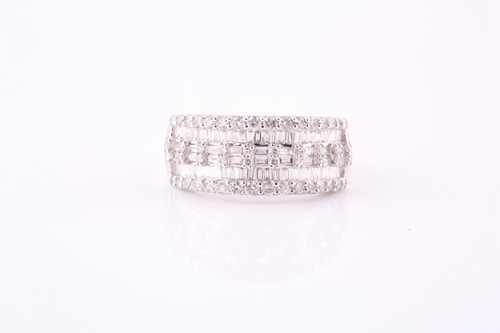 Lot 424 - A diamond dress ring Set to the front with...