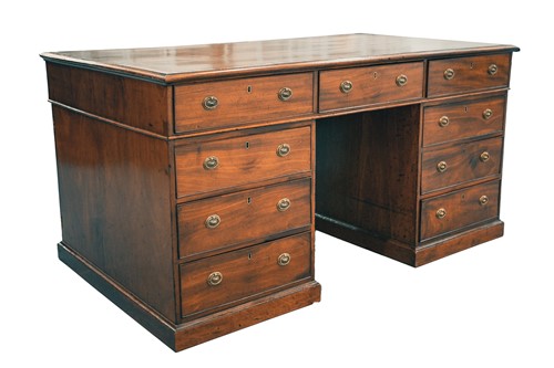Lot 307 - A George IV figured mahogany kneehole...