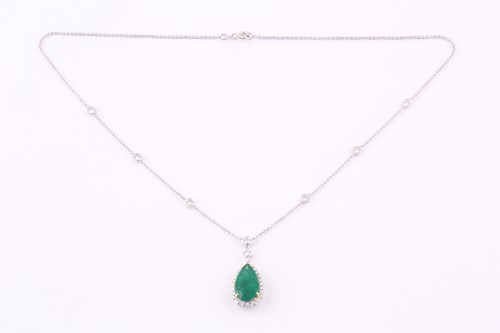 Lot 363 - An emerald and diamond pendant necklace, the...