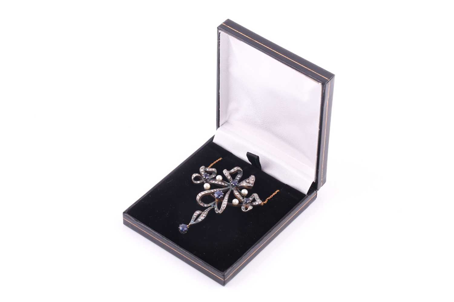 Lot 526 - An Edwardian style sapphire, diamond and pearl...