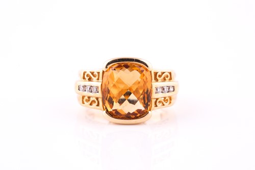 Lot 448 - A citrine and diamond dress ring, the cushion...