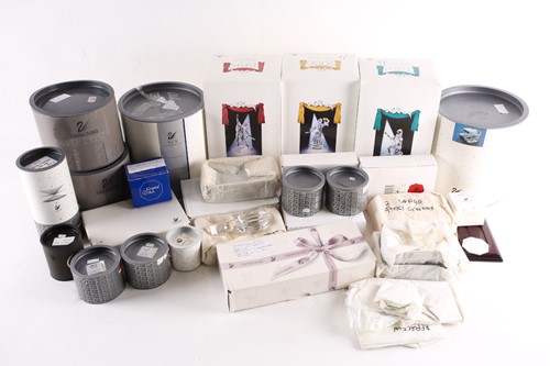 Lot 298 - A collection of boxed Swarovski crystal...