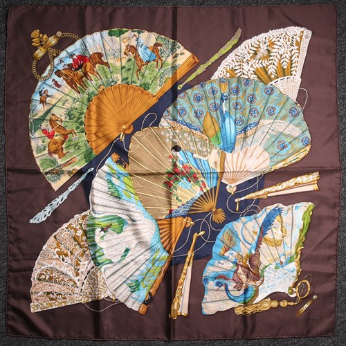 Lot 317 - A Hermes Brise de Charme a silk scarf designed...