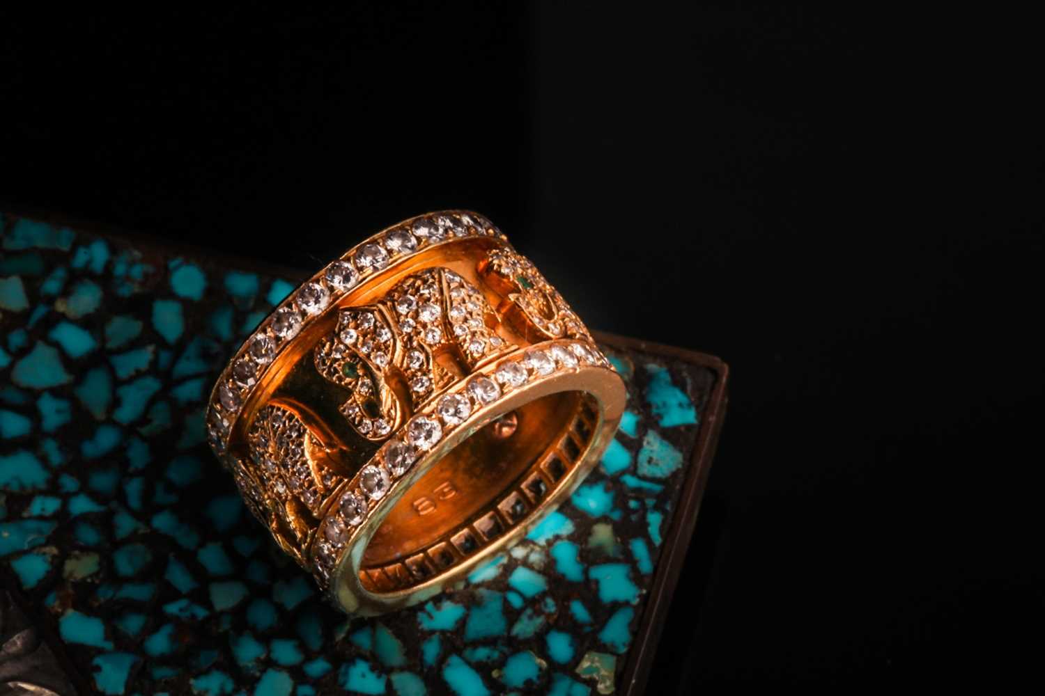 Lot 232 - A Cartier 'Elephant' ring, the wide band...