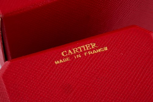 Lot 232 - A Cartier 'Elephant' ring, the wide band...