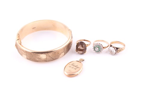 Lot 269 - A 9ct yellow gold hinged bangle, Birmingham...