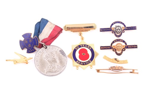 Lot 316 - A collection of gold and base metal badges,...