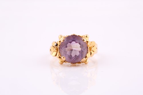 Lot 131 - A French amethyst dress ring, the yellow metal...