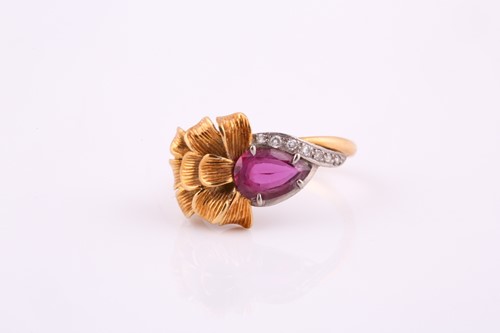 Lot 17 - An 18 carat yellow and white gold ruby and...