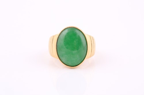 Lot 205 - A yellow metal signet style ring set with an...