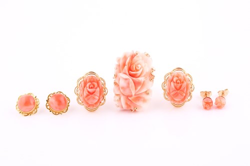 Lot 224 - A carved coral ring, of rectangular form...