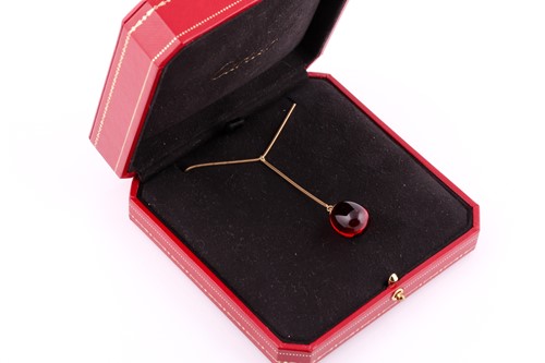 Lot 74 - A Baccarat red crystal egg pendant necklace,...