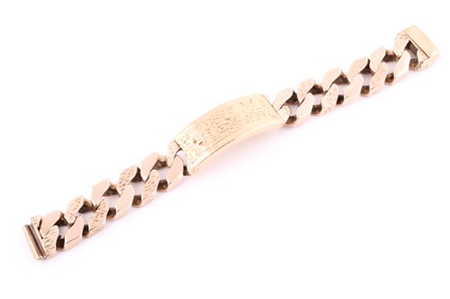 Lot 234 - A 9ct yellow gold heavy curb link ID bracelet,...