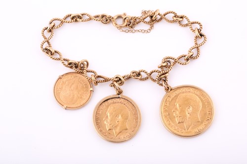 Lot 300 - A 9ct yellow gold twisted eternity link charm...