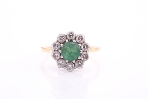Lot 81 - An 18ct gold emerald and diamond cluster ring,...
