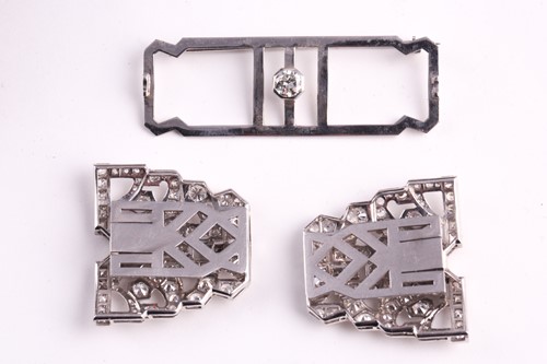 Lot 12 - An Art Deco diamond lapel brooch, the large...
