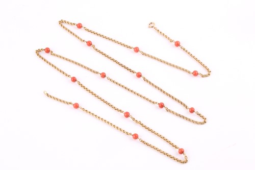 Lot 245 - A yellow precious metal and coral bead...