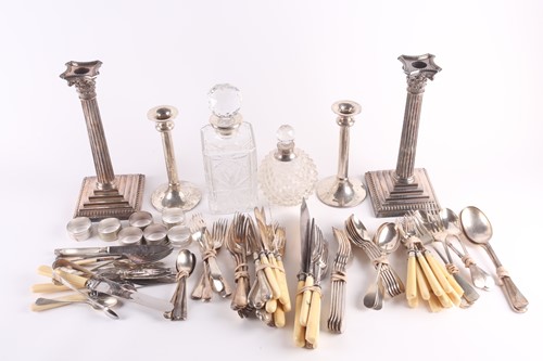 Lot 323 - A pair of modern silver table candlesticks,...