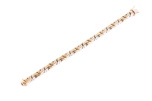 Lot 6 - An 18ct yellow and white gold two-tone...