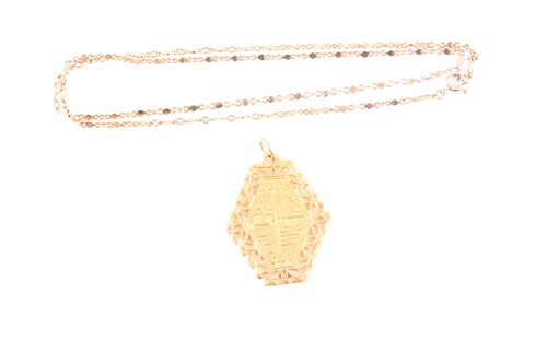 Lot 73 - A Chinese yellow precious metal lozenge shape...