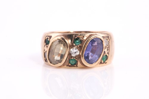 Lot 49 - A sapphire, peridot, diamond and emerald bombe...