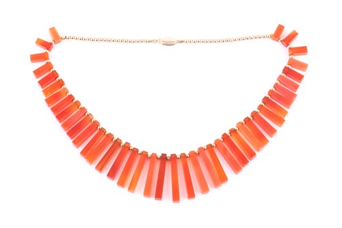 Lot 33 - An Art Deco style carnelian fringe necklace,...