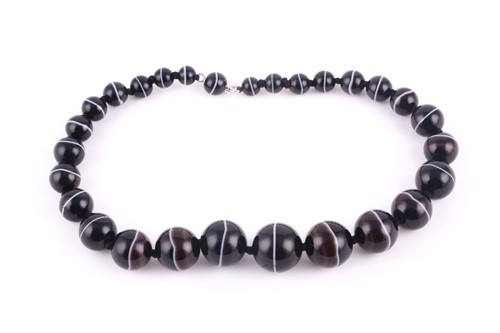 Lot 178 - An antique graduated banded agate bead...