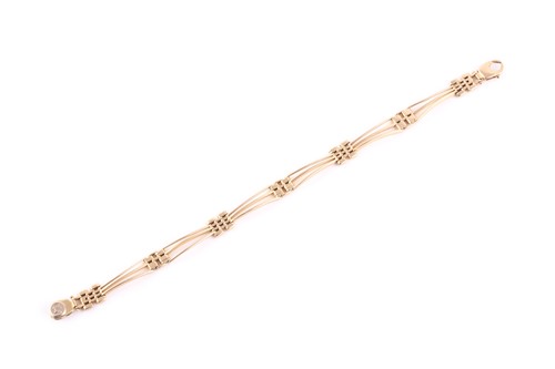 Lot 42 - An 18ct yellow gold triple bar bracelet, the...