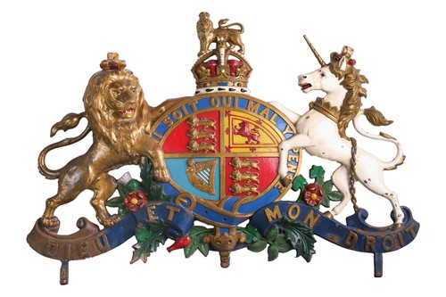 Lot 468 - A very large cast iron and painted Royal Coat...