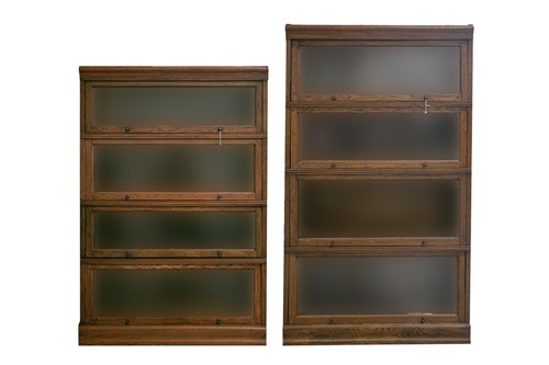 Lot 261 - Two Globe Wernicke style stacking oak 'Mevoto'...