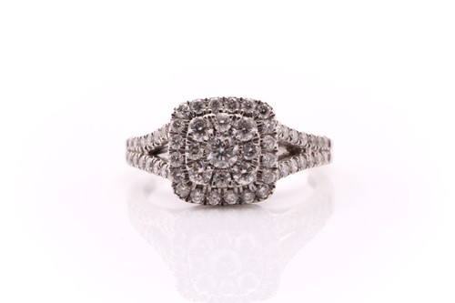 Lot 389 - A diamond cluster ring; the tiered,...