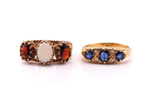 Lot 625 - An Edwardian seven stone half hoop sapphire...