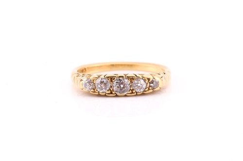 Lot 846 - A five stone half hoop diamond ring; the...