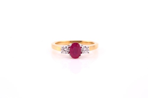 Lot 113 - A ruby and diamond three stone half hoop ring;...