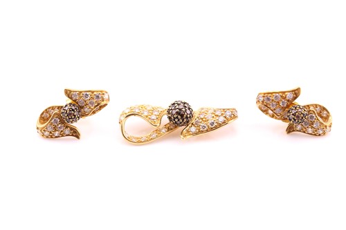 Lot 624 - A pair of 18 carat gold, gem-set, twisted...