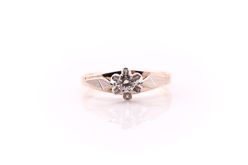 Lot 9 - A single stone diamond ring; the round...