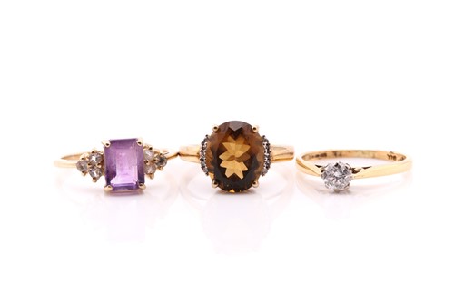 Lot 89 - A single stone diamond ring; the round...