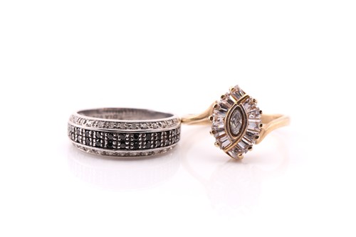 Lot 540 - A four row black and white diamond, pavé set,...