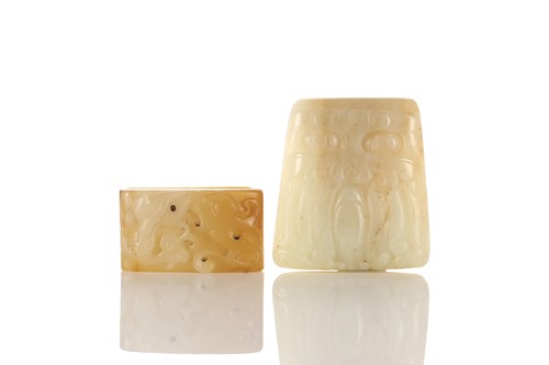 Lot 130 - A Chinese jade sword fitting, of rectangular...