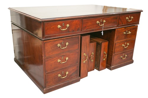 Lot 300 - A mahogany kneehole partners desk, George IV,...