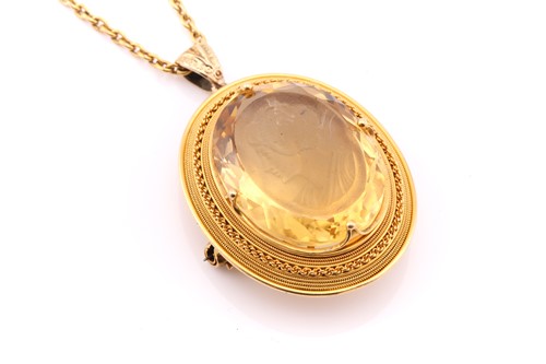 Lot 103 - A late 19th century carved citrine intaglio...