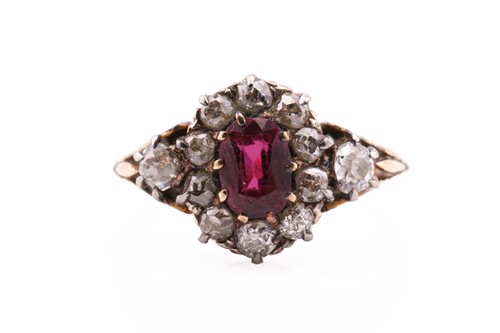 Lot 135 - A late Victorian ruby and diamond cluster ring;...