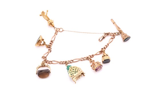 Lot 163 - A 9ct fancy curb link charm bracelet, the...